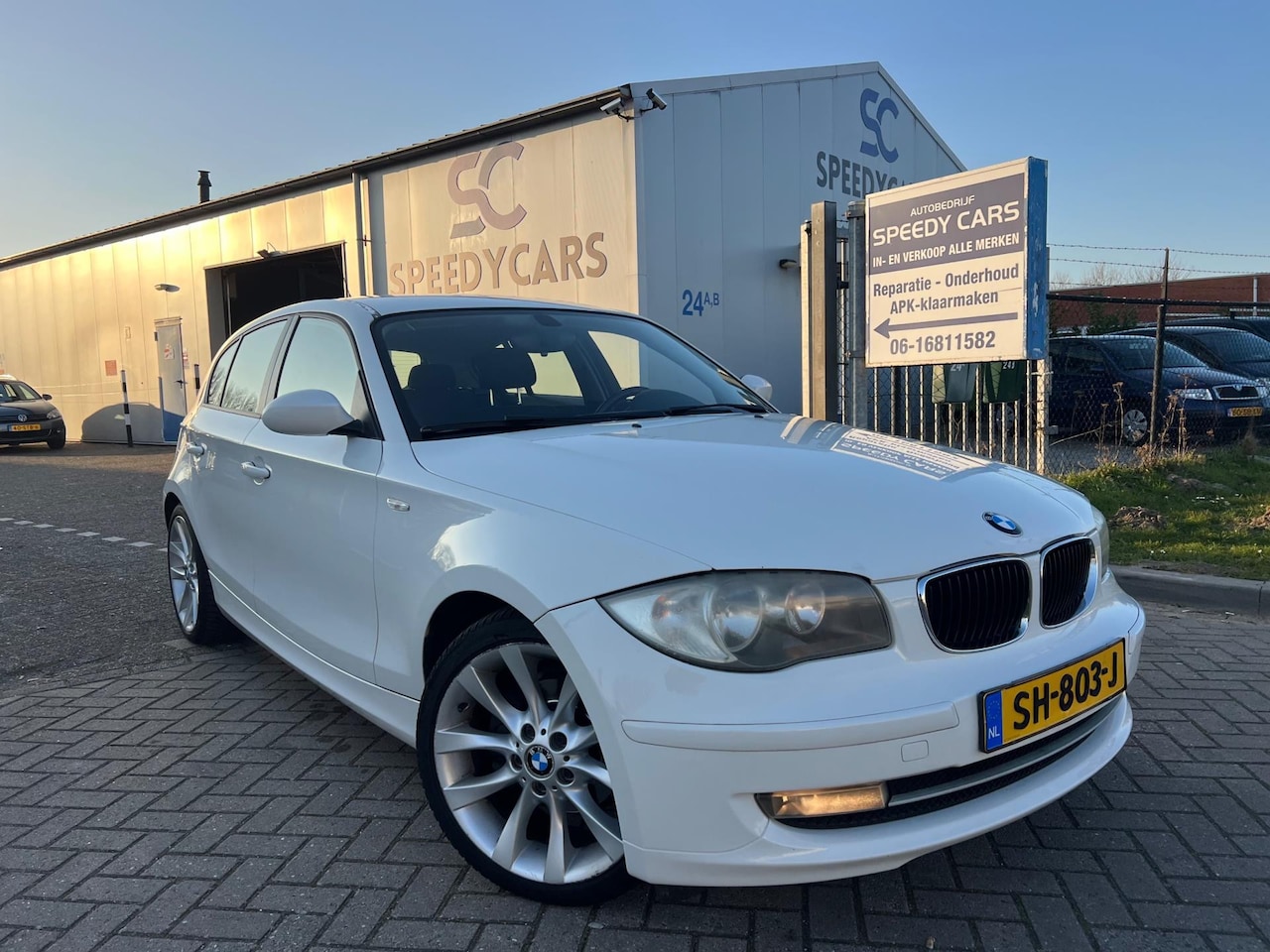 BMW 1-serie - 118i 2008 5DRS Sport Airco LMV Wit - AutoWereld.nl