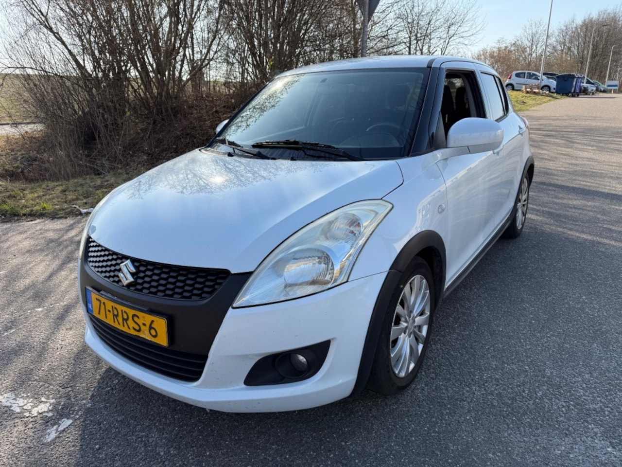 Suzuki Swift - 1.2 EXCLUSIVE EASSS CLIMA PDC STOELVERWARMING - AutoWereld.nl