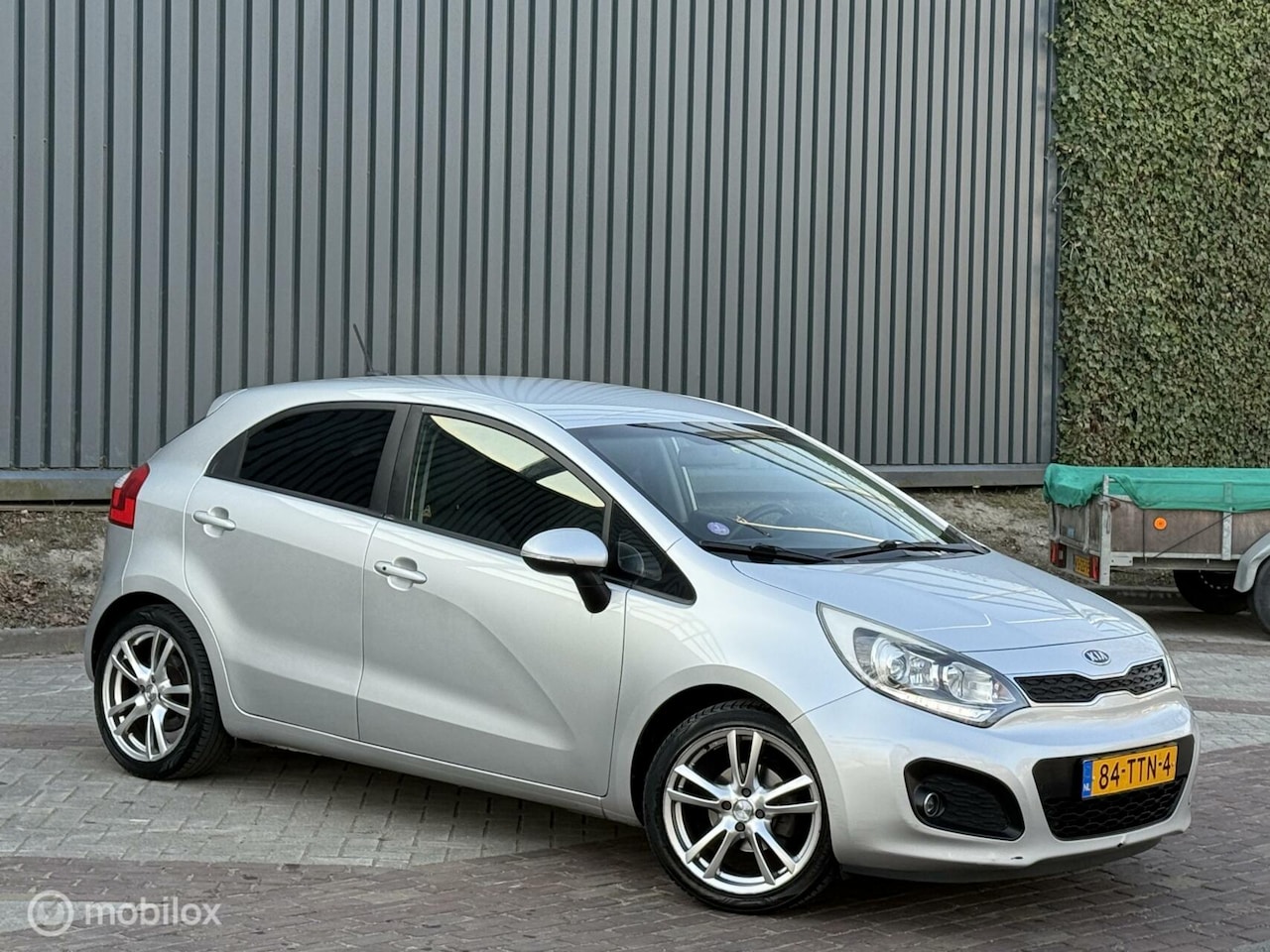 Kia Rio - 1.2 1e Eignr|Led|Navi|Cruise|Clima|Lmv|Nap|Boekjes - AutoWereld.nl