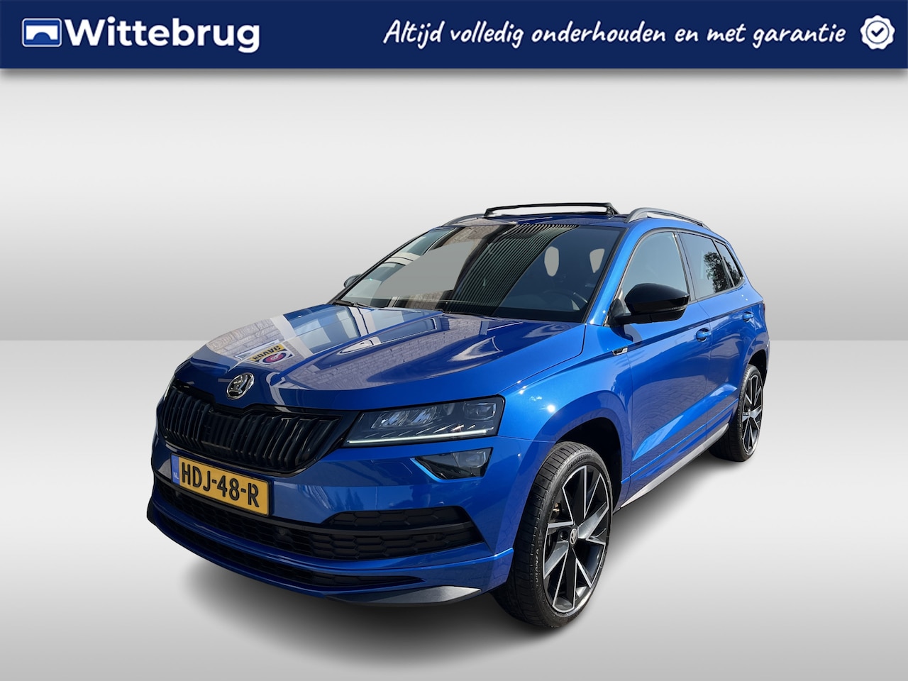 Skoda Karoq - 1.5 TSI ACT Sportline Business / PANO/ KEYLESS/ DIGITAL DASH/ CRUISE/ PARK. SENSOREN/ SMAR - AutoWereld.nl