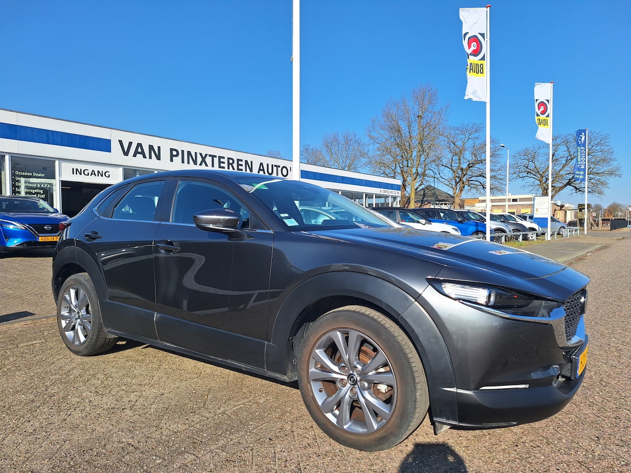 Mazda CX-30 - 2.0 e-SkyActiv-G M Hybrid 360 camera/stoelverwarming/(26-12-2022)/PDC v&a/enz..... - AutoWereld.nl