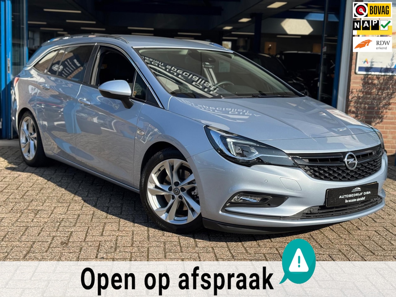 Opel Astra Sports Tourer - 1.6 CDTI Business+ 2016 GRIJS NAVI - AutoWereld.nl