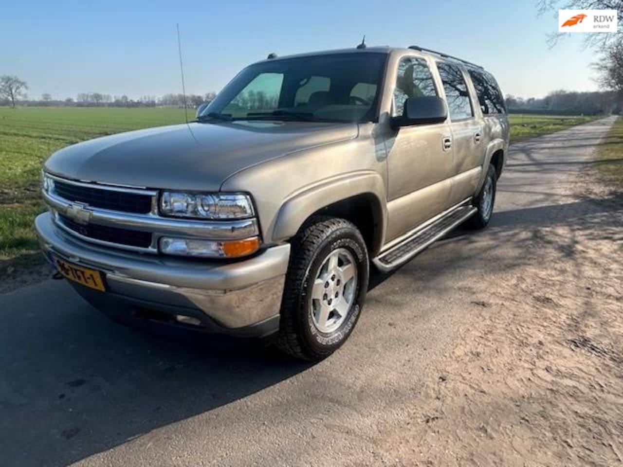 Chevrolet Suburban - Benzine en LPG, 8 zitter, topconditie - AutoWereld.nl