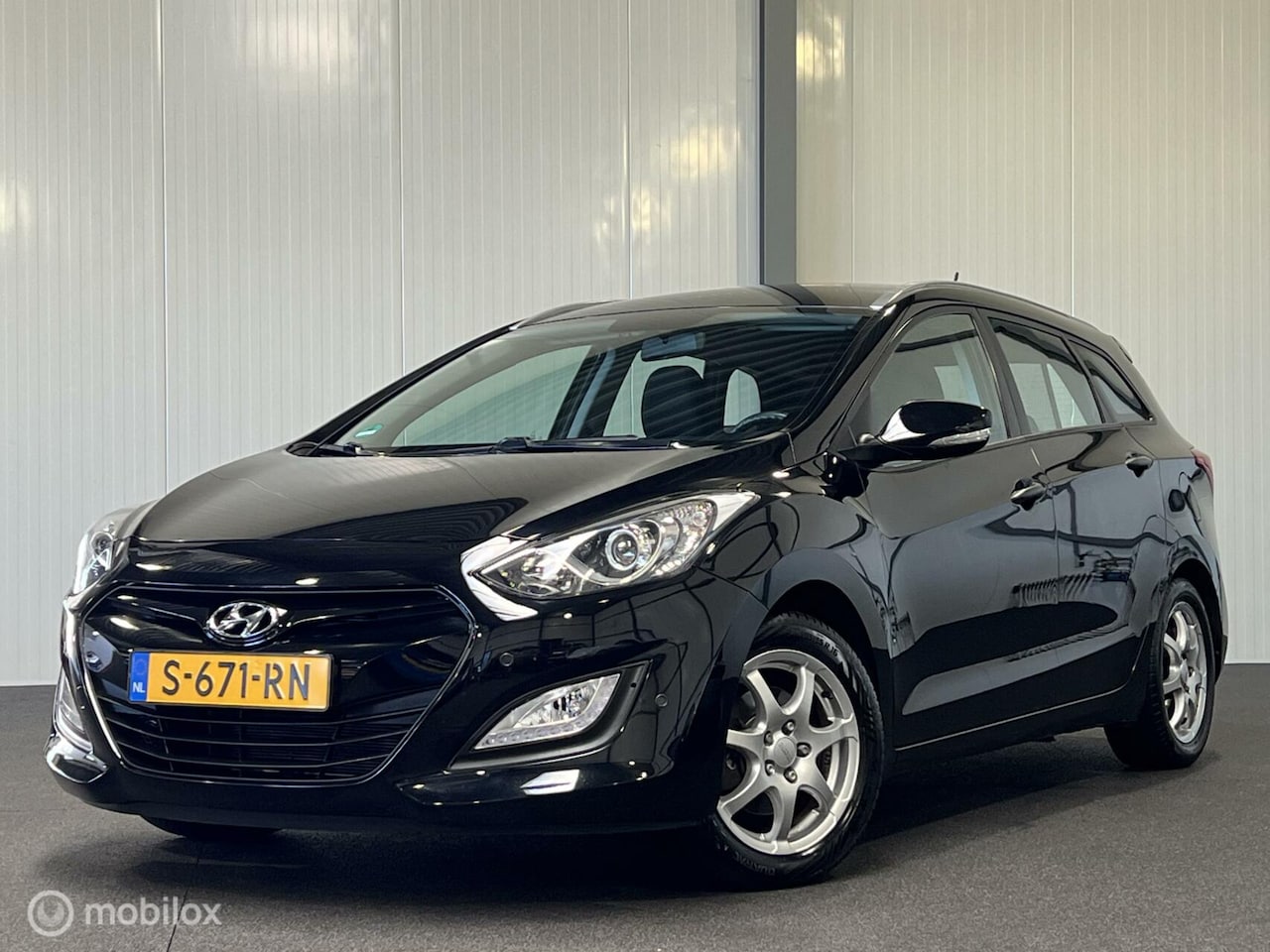 Hyundai i30 Wagon - 1.4 [ historie trekhaak camera LM clima ] - AutoWereld.nl