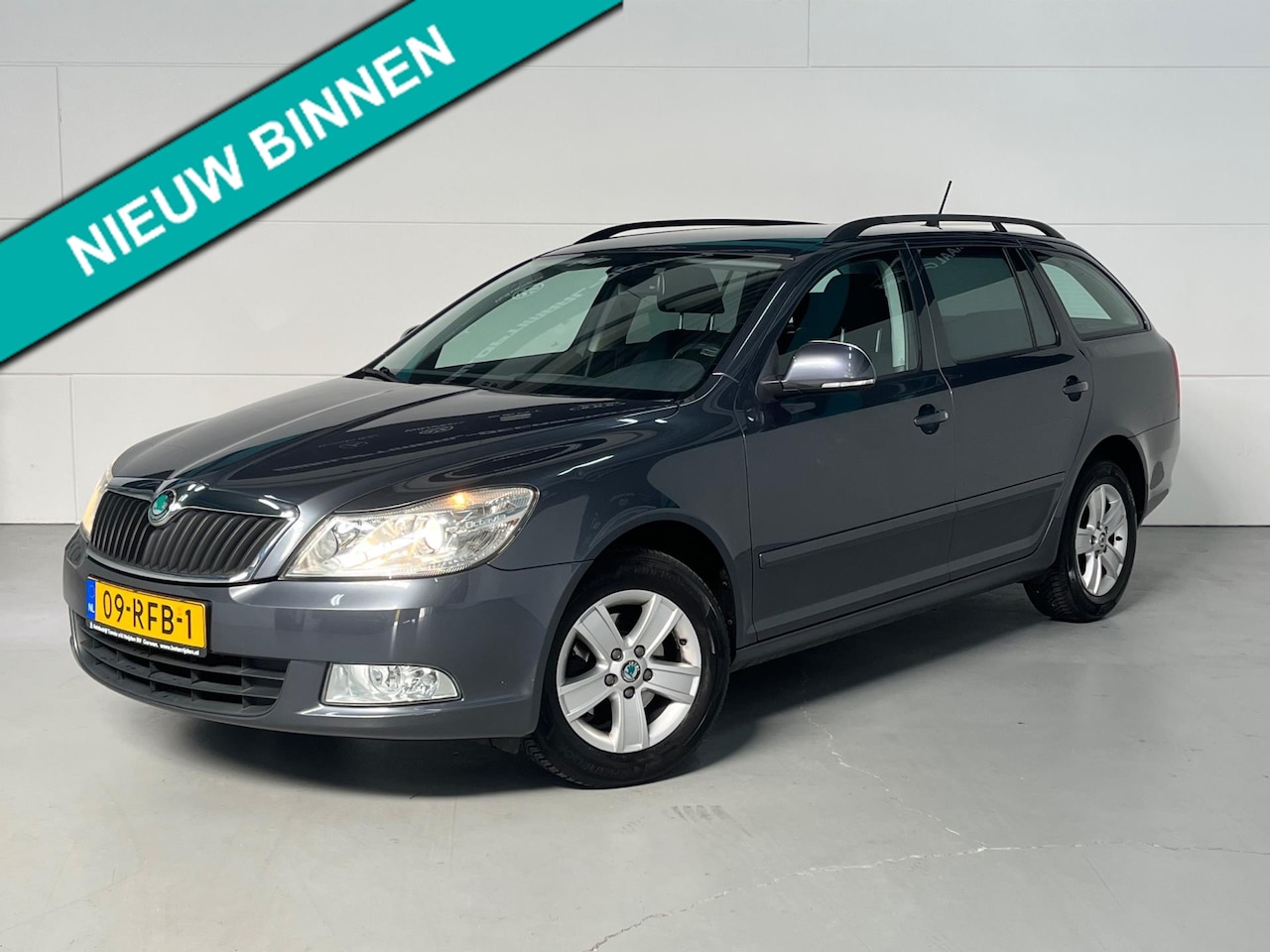 Skoda Octavia Combi - 1.2 TSI Ambition Cruise Navi MF-stuur Pdc Trekhaak Clima - AutoWereld.nl