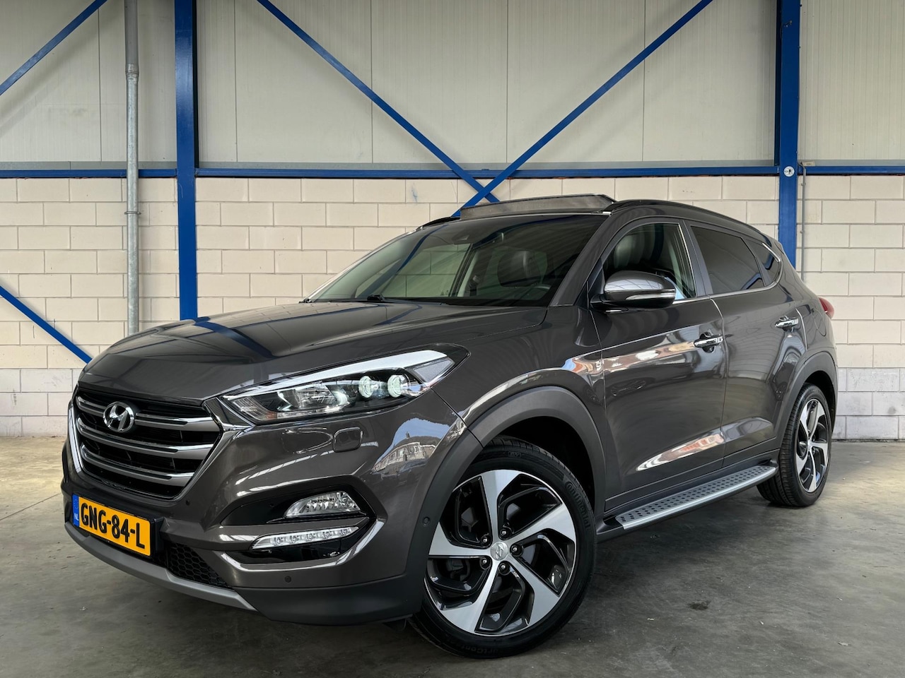 Hyundai Tucson - 1.6 T-GDi Premium 4WD PANO|TREKHAAK|VOLSTE UITVOERING! - AutoWereld.nl