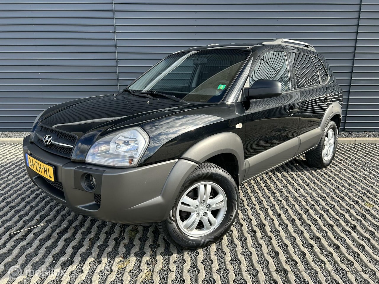 Hyundai Tucson - 2.0i Dynamic 142 PK | Airco | Trekhaak - AutoWereld.nl