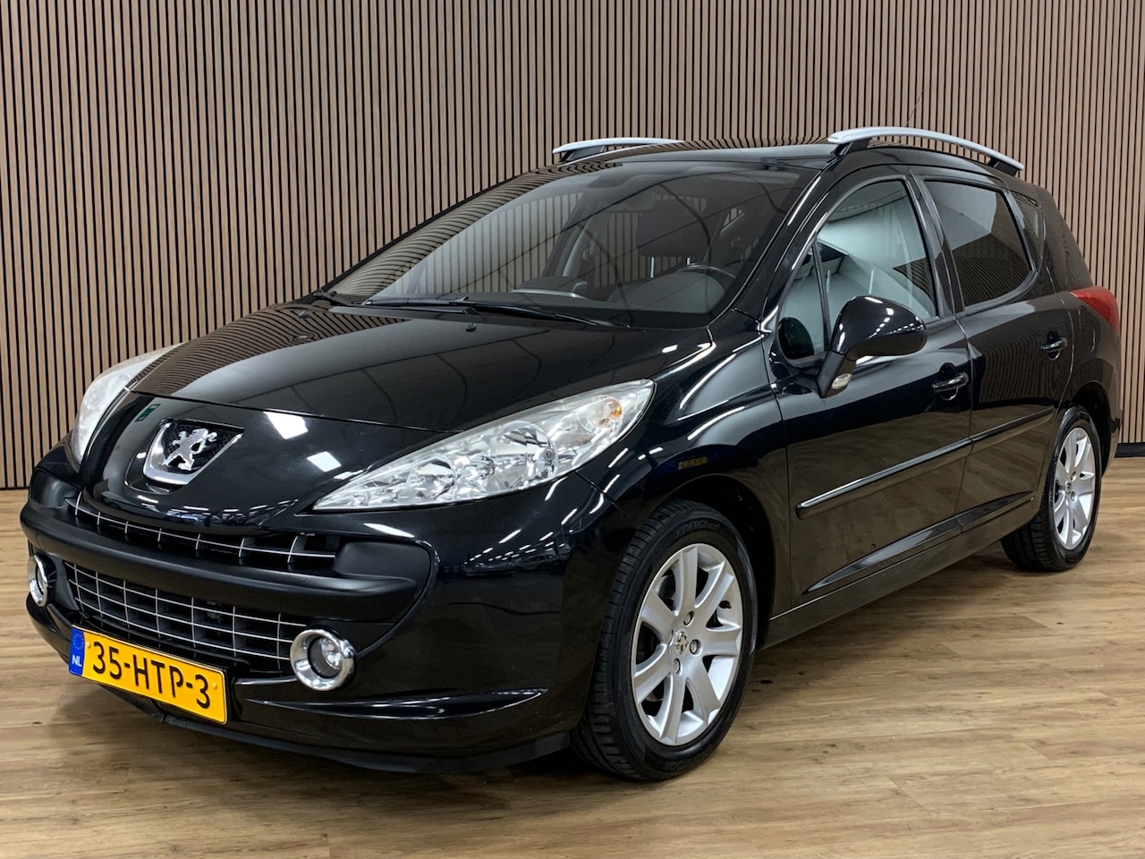 Peugeot 207 SW - 1.6 VTi XS Première|Navigatie|Panoramadak|Climate Control| - AutoWereld.nl