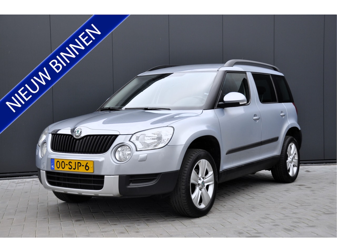 Skoda Yeti - 1.2 TSI Tour Navi Trekhaak - AutoWereld.nl