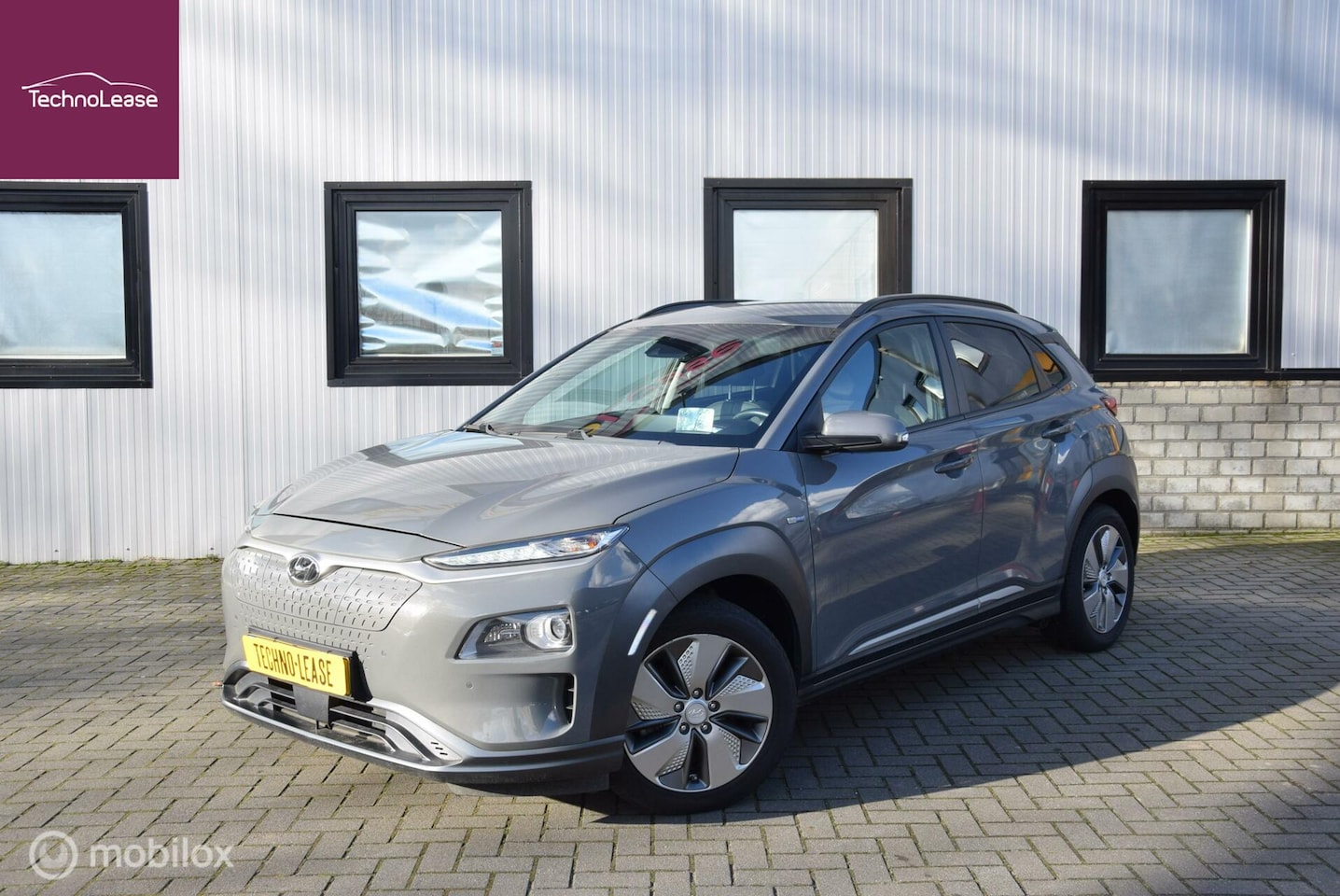 Hyundai Kona Electric - EV Premium 64 kWh Headup Dislay & vaste Trekhaak - AutoWereld.nl