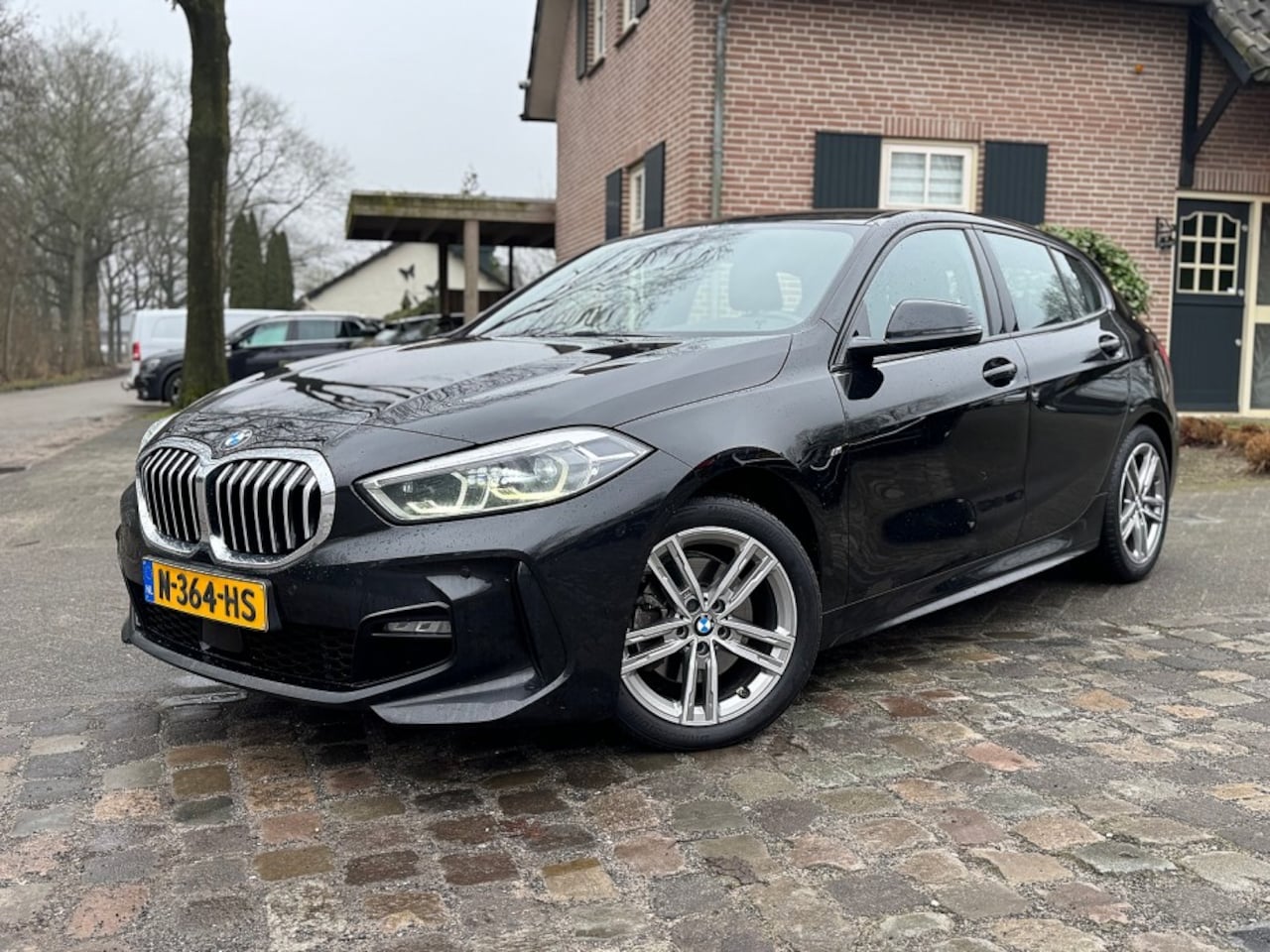 BMW 1-serie - 118 i Bns Ed M-pakket ecc,1/2leer,led,navi,lmv - AutoWereld.nl