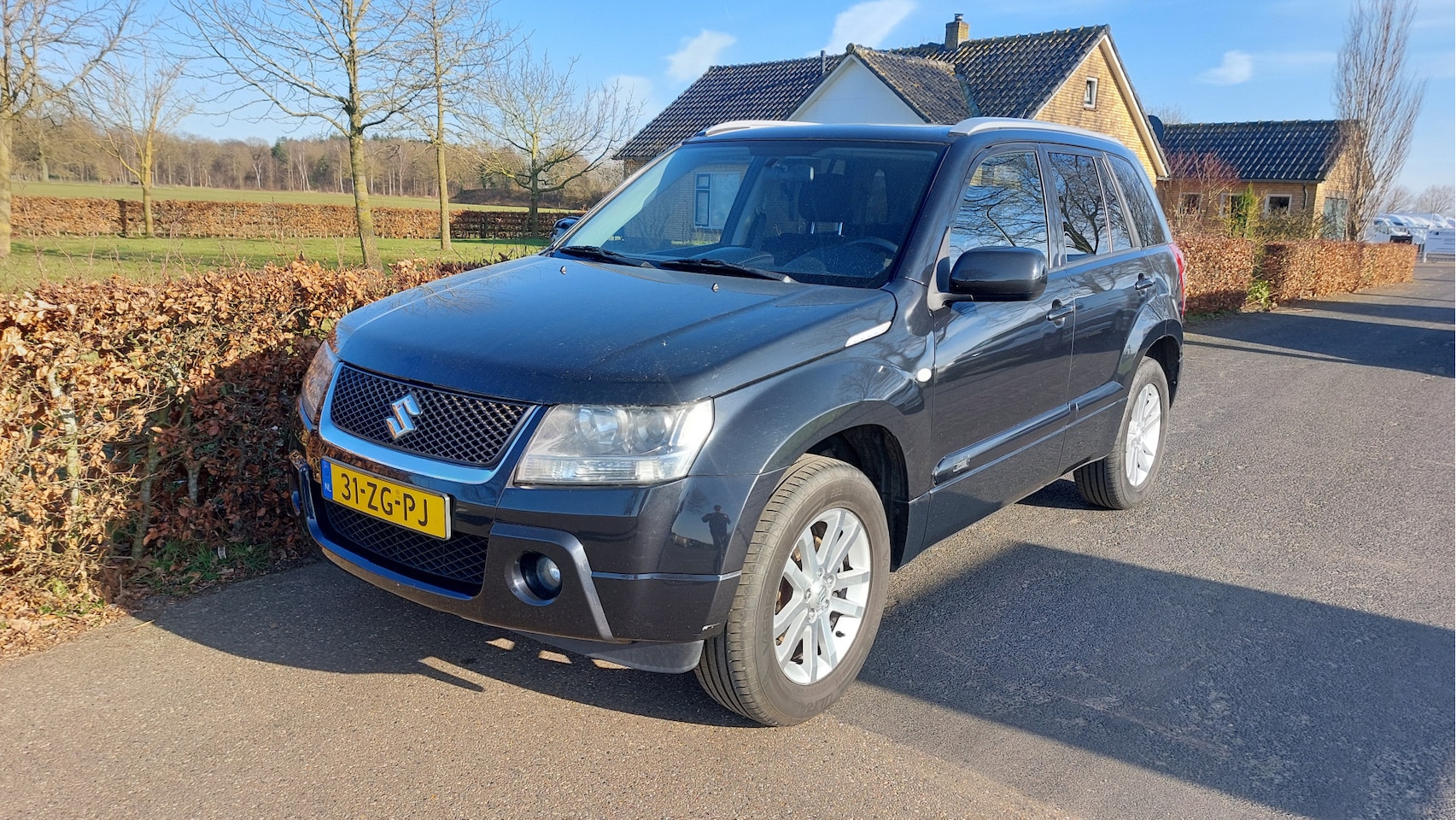 Suzuki Grand Vitara - 2.0-16V 4x4 Limited CLIMA BJ 2008 - AutoWereld.nl