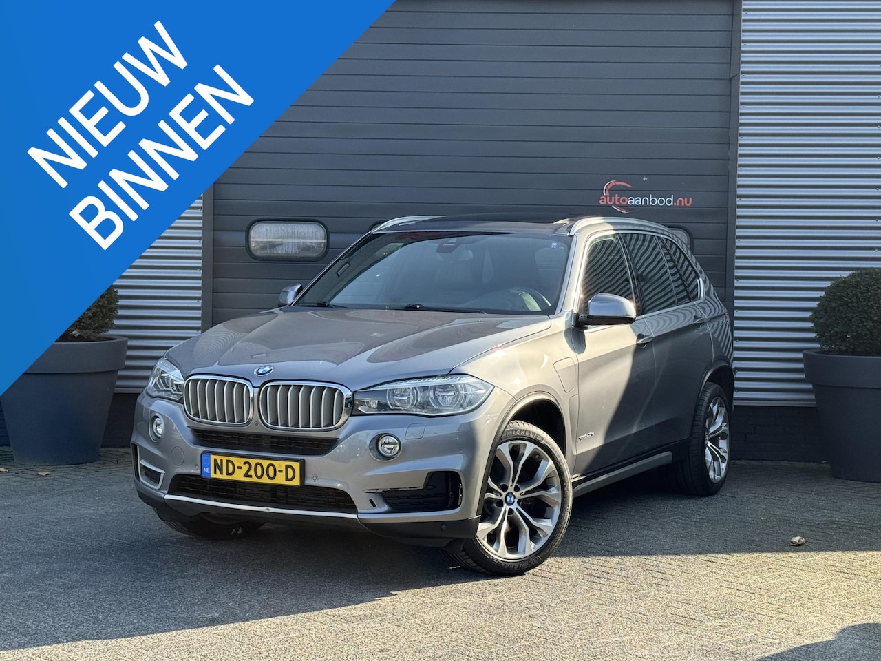 BMW X5 - xDrive40e iPerformance High Executive | Panoramadak | Head-Up Display | Camera | Lane Assi - AutoWereld.nl