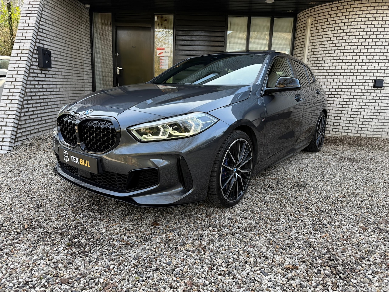 BMW 1-serie - M135i xDrive High Executive |Pano|HUD|1e eig| ETC! - AutoWereld.nl