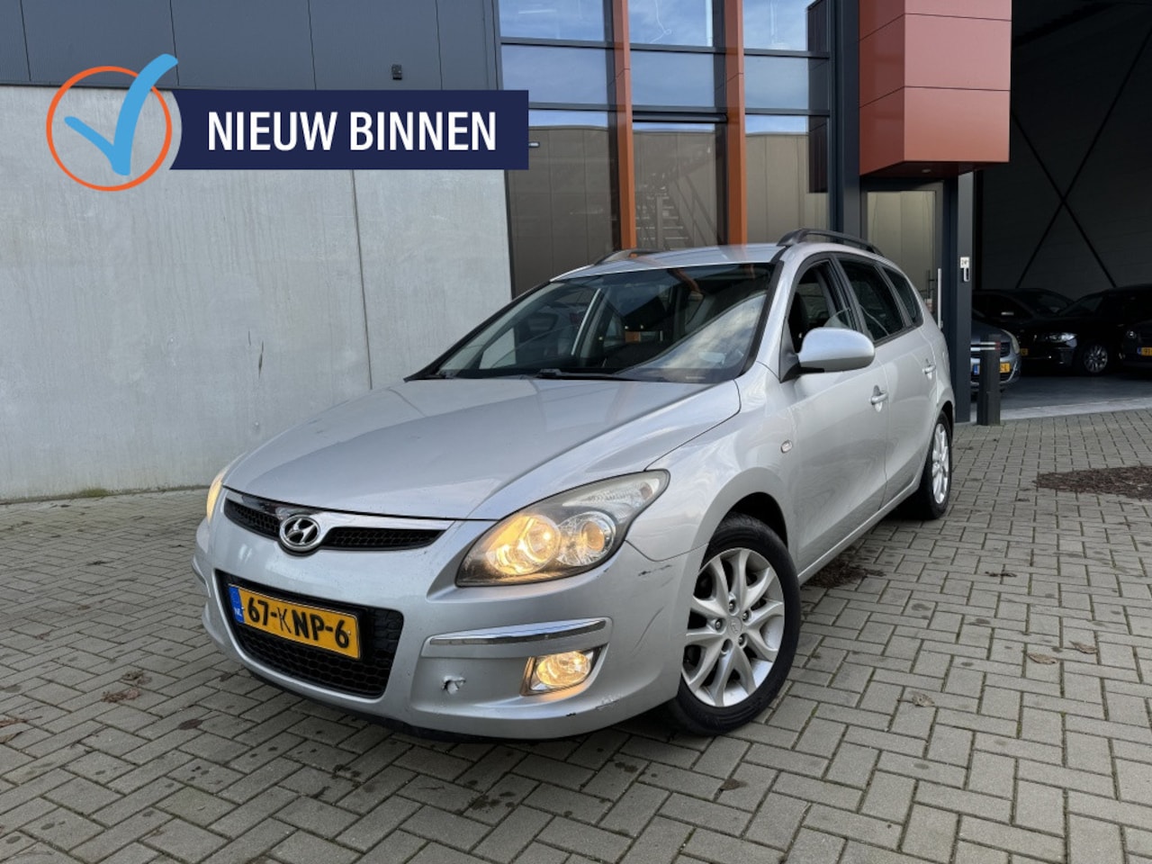 Hyundai i30 CW - 1.6i Dynamic ECC NAVI NAP BT - AutoWereld.nl