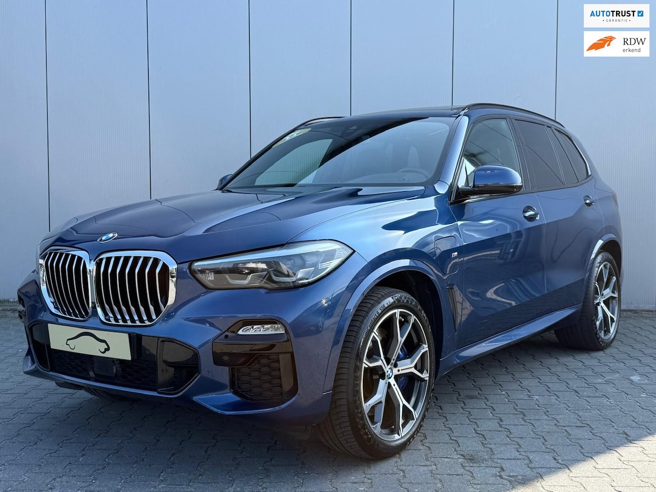 BMW X5 - XDrive45e High Executive M Sport / Pano / M Competition Stoelen / H&K Audio - AutoWereld.nl