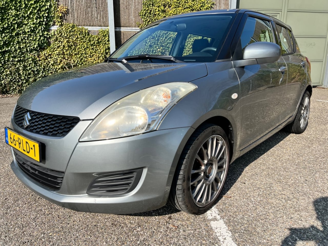 Suzuki Swift - 1.2 Comfort EASSS SPORTLINE | AIRCO - AutoWereld.nl