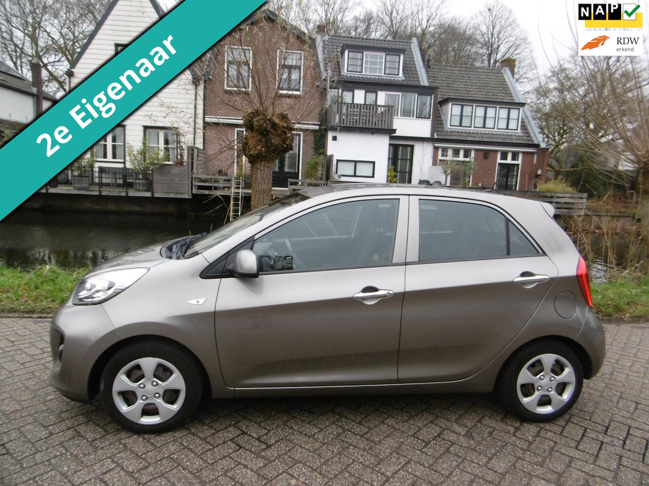 Kia Picanto - 1.2 CVVT 84pk 4-Cilinder Dynamic 5-deurs Clima Cruise 2e eig. Zuinig - AutoWereld.nl