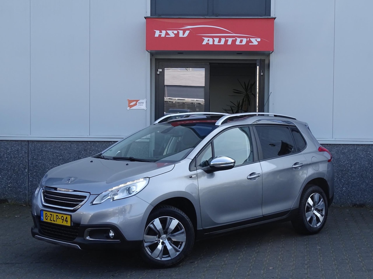 Peugeot 2008 - 1.2 PureTech Style navi LM airco org NL - AutoWereld.nl