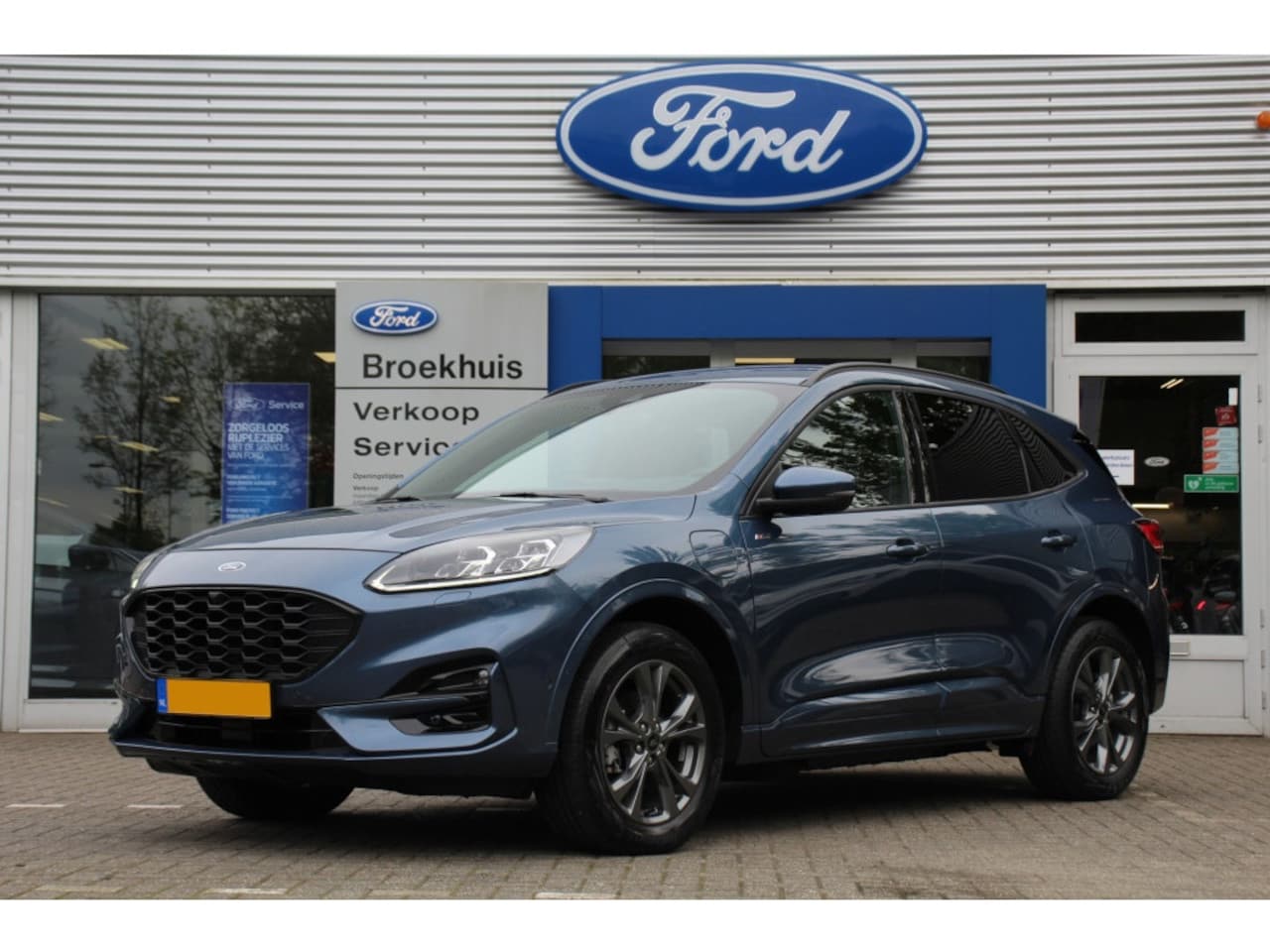 Ford Kuga - 1.5EB ST-LINE X | TREKHAAK 1800KG | LEDER | ADAPTIVE CRUISE | HEAD-UP | EL. ACHTERKLEP | C - AutoWereld.nl