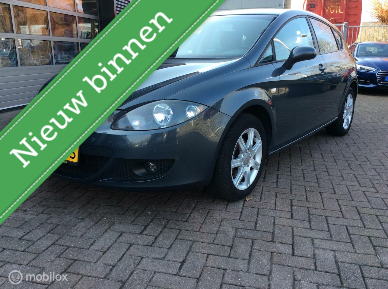 Seat Leon - 1.6 Sportstyle Climate Contr Leder Lm Vlg Nap Cr Contr - AutoWereld.nl