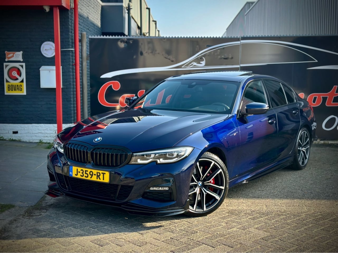 BMW 3-serie - 320i M-PERFORMANCE DAK|M STOEL|MEMORY|CAM|HiFi - AutoWereld.nl