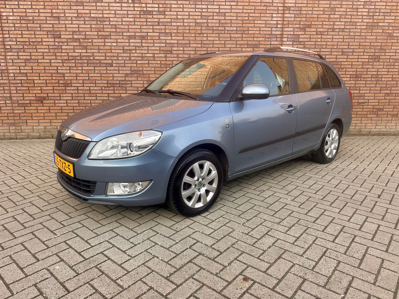 Skoda Fabia Combi - 1.2 TSI Style Combi ( 1e eigenaar trekhaak airco ) - AutoWereld.nl