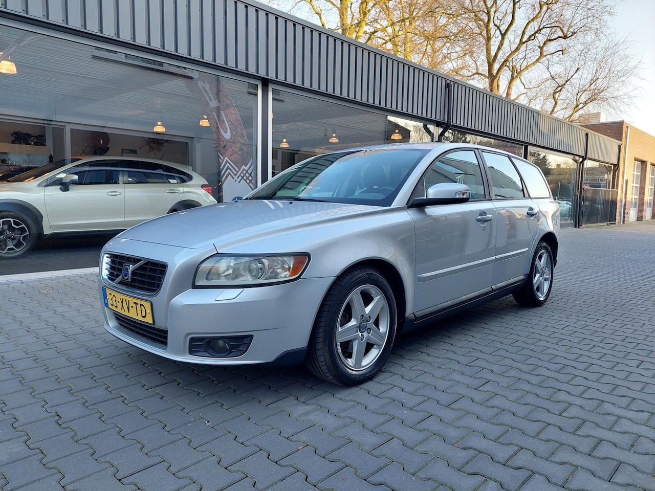 Volvo V50 - 1.8 Edition I 12 jaar dezelfde eigenaar Regensensor Clima Cruise Trekhaak 16 inch Lichtmet - AutoWereld.nl