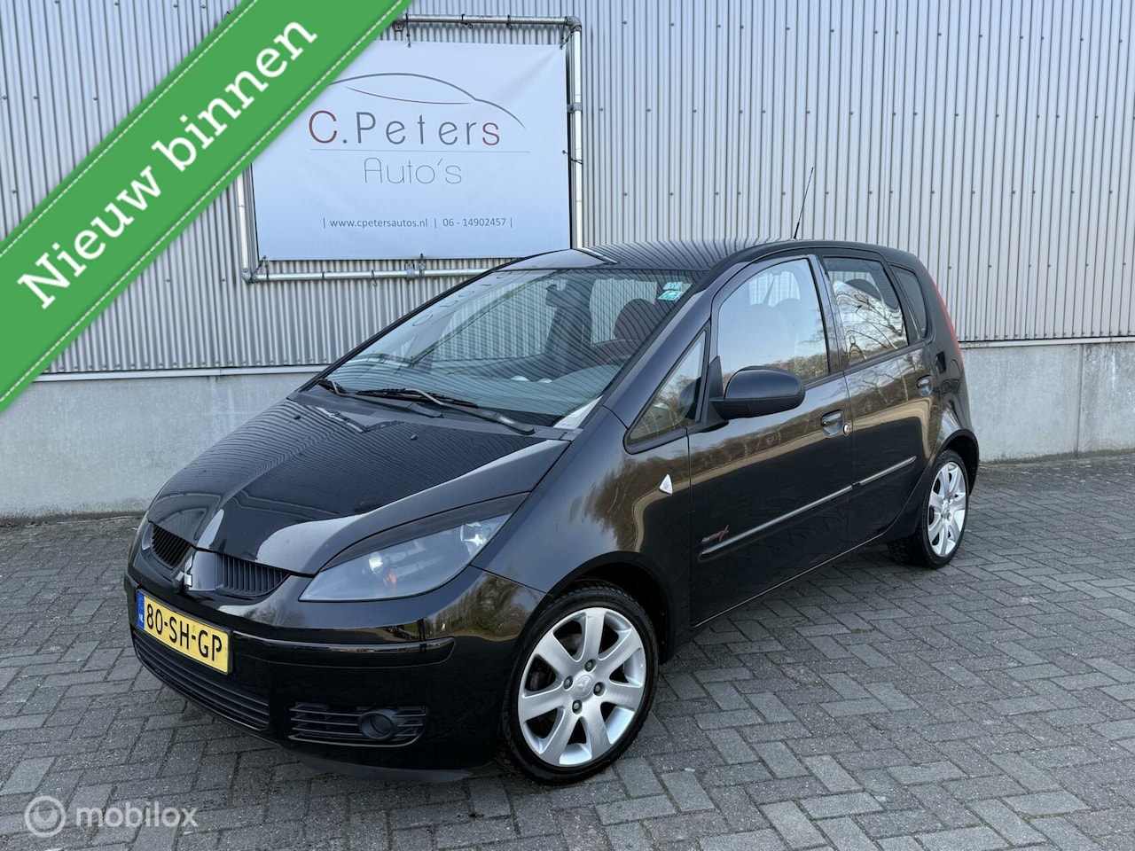 Mitsubishi Colt - 1.3 95pk Invite 2006 5deurs / Airco / 16” LM velgen / 4seizoensbanden / NAP - AutoWereld.nl