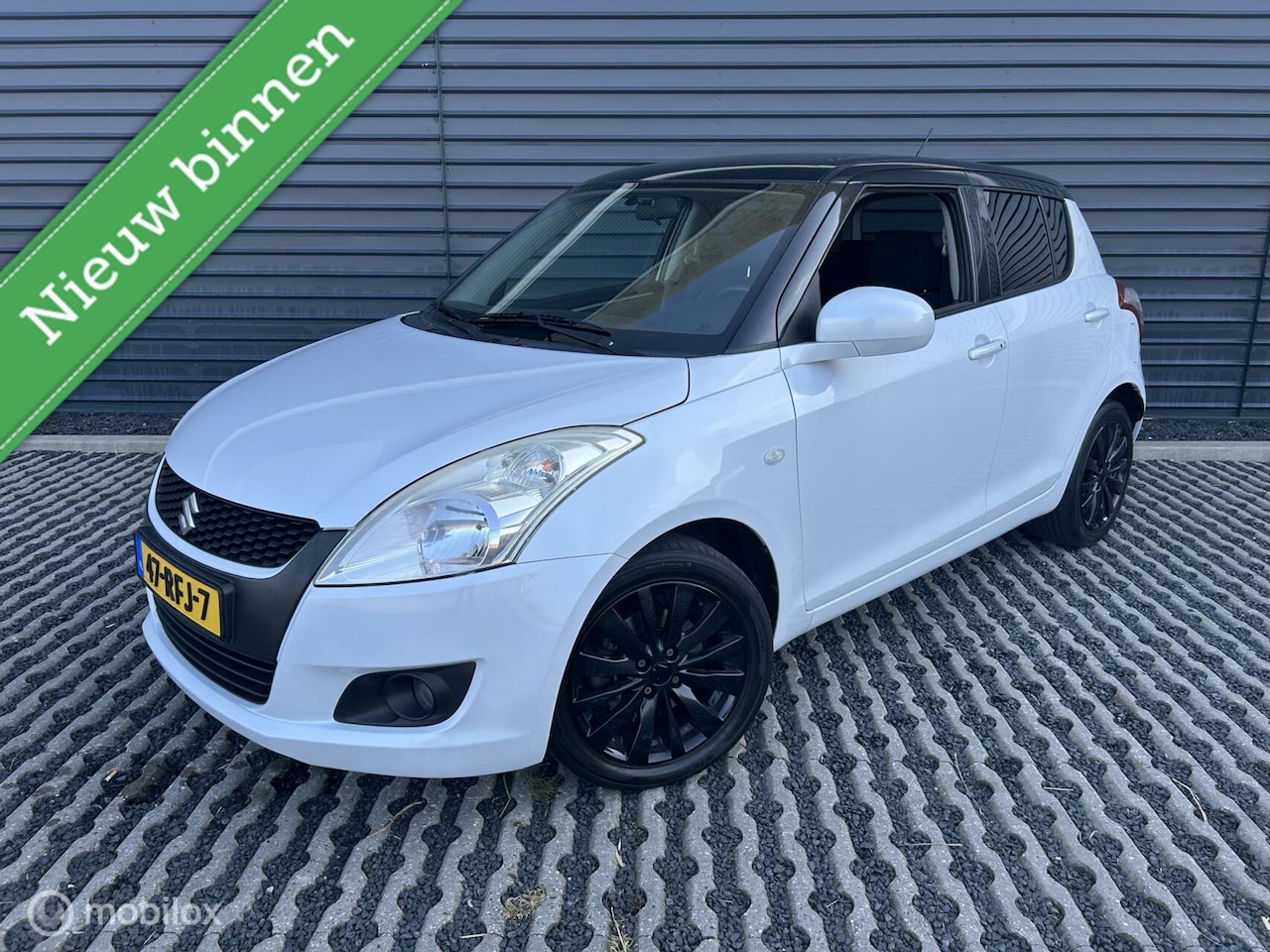 Suzuki Swift - 1.2 Exclusive 5 deurs | 2 eigenaar | Aut. airco - AutoWereld.nl