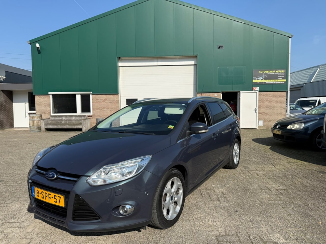 Ford Focus Wagon - 1.6 ECOnetic Titanium Bomvol Led Xenon Leder Airco Cruise Navi Trekhaak - AutoWereld.nl