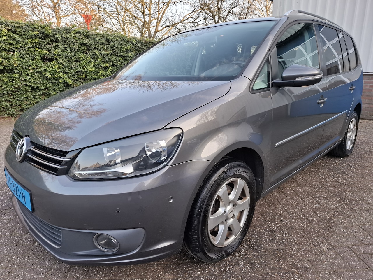 Volkswagen Touran - 1.6 TDI Highline BlueMotion 7p. LEER/CLIMAT/CRUISE/NAVI/PDC 105PK - AutoWereld.nl