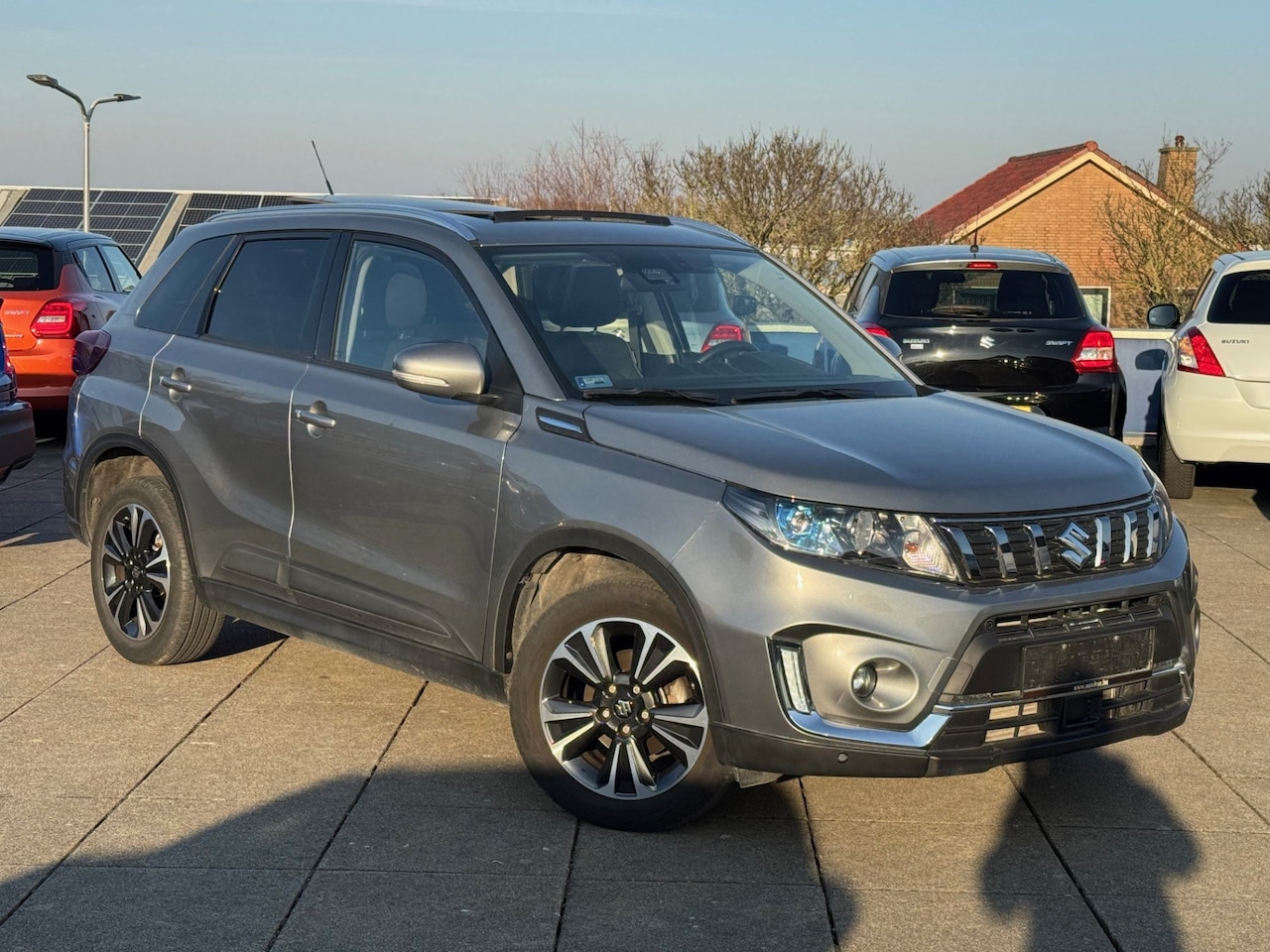 Suzuki Vitara - 1.4 Boosterjet Style AllGrip Automaat | Opendak | 4x4 - AutoWereld.nl