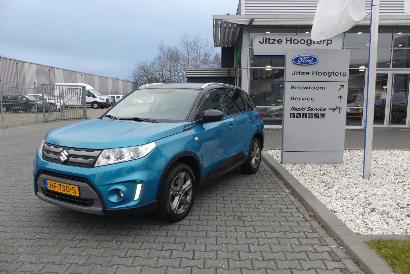 Suzuki Vitara - 1.6 Exclusive 1.6 Exclusive ,NAVI,TREKHAAK,AIRCO,CAMERA,TWO-TONE METALLIC. - AutoWereld.nl