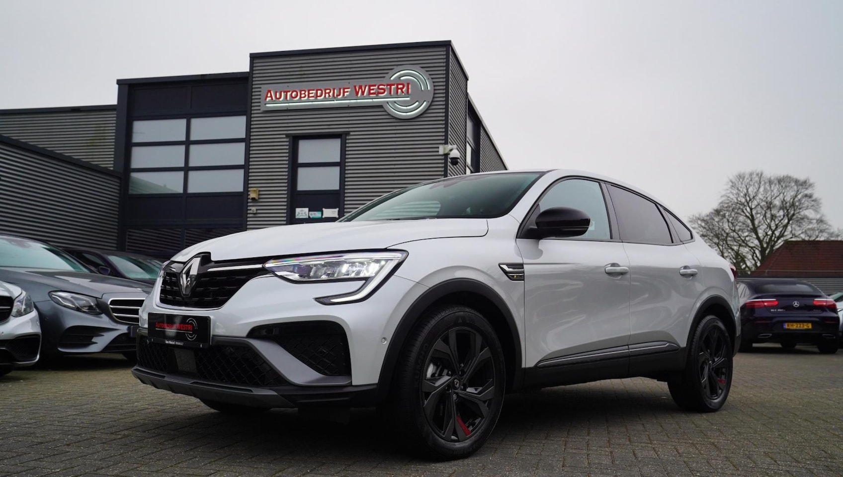 Renault Arkana - 1.6 E-Tech Hybrid 145 Intens | Stuurwiel verwarming | Carbon | Achteruitrijcamera - AutoWereld.nl