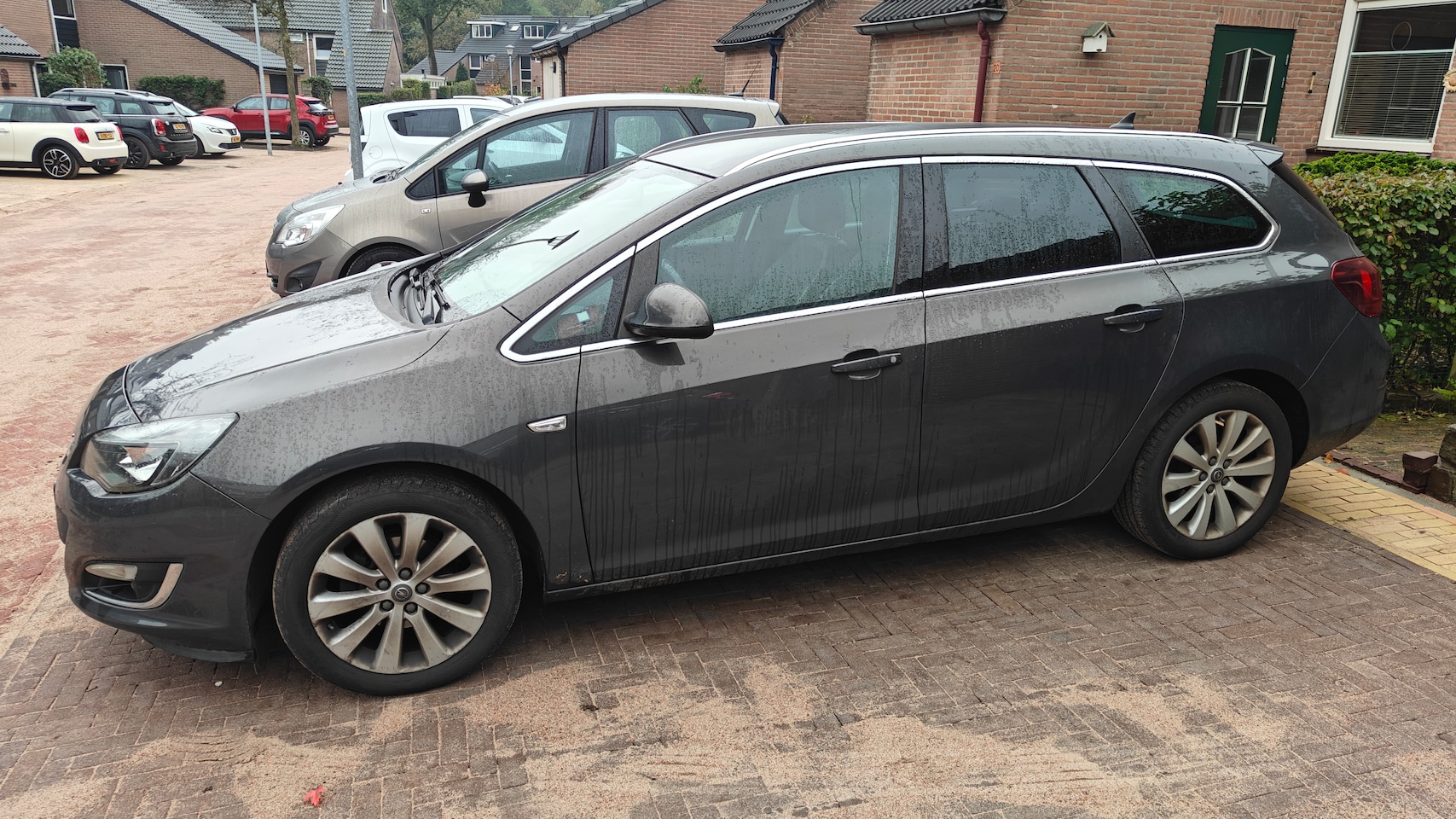 Opel Astra Sports Tourer - 1.4 Edition navigatie - AutoWereld.nl