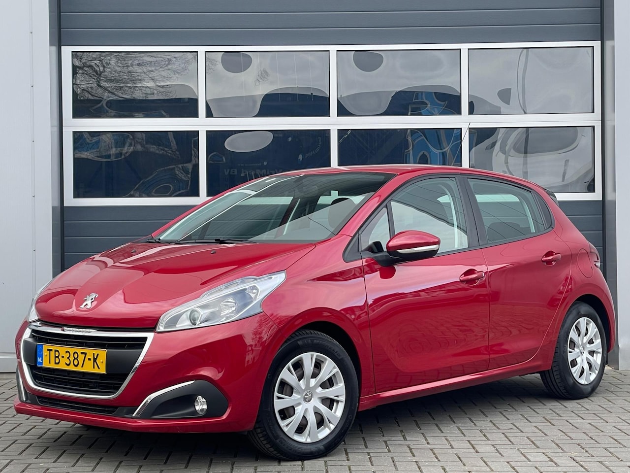 Peugeot 208 - 1.2 PureTech Blue Lion | Navi | Carplay | Cruise control | PDC | DAB+ - AutoWereld.nl