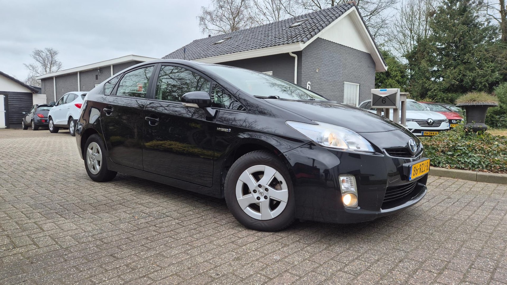 Toyota Prius - 1.8 Comfort CLIMA-NAVI-BJ 2011 - AutoWereld.nl