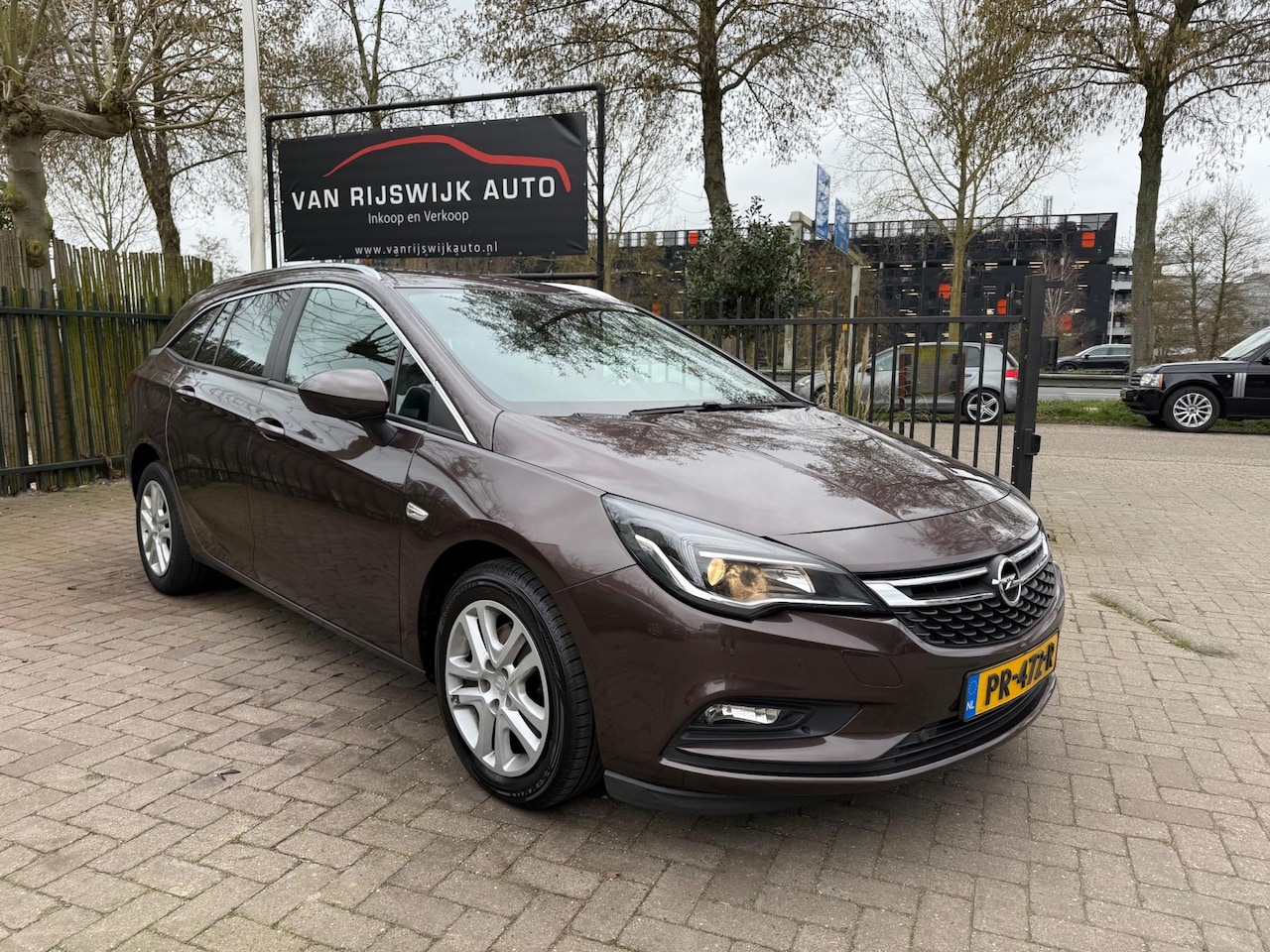 Opel Astra Sports Tourer - 1.6 CDTI Business+ €5690,- NETTO Nav Clima Dealer Ond - AutoWereld.nl