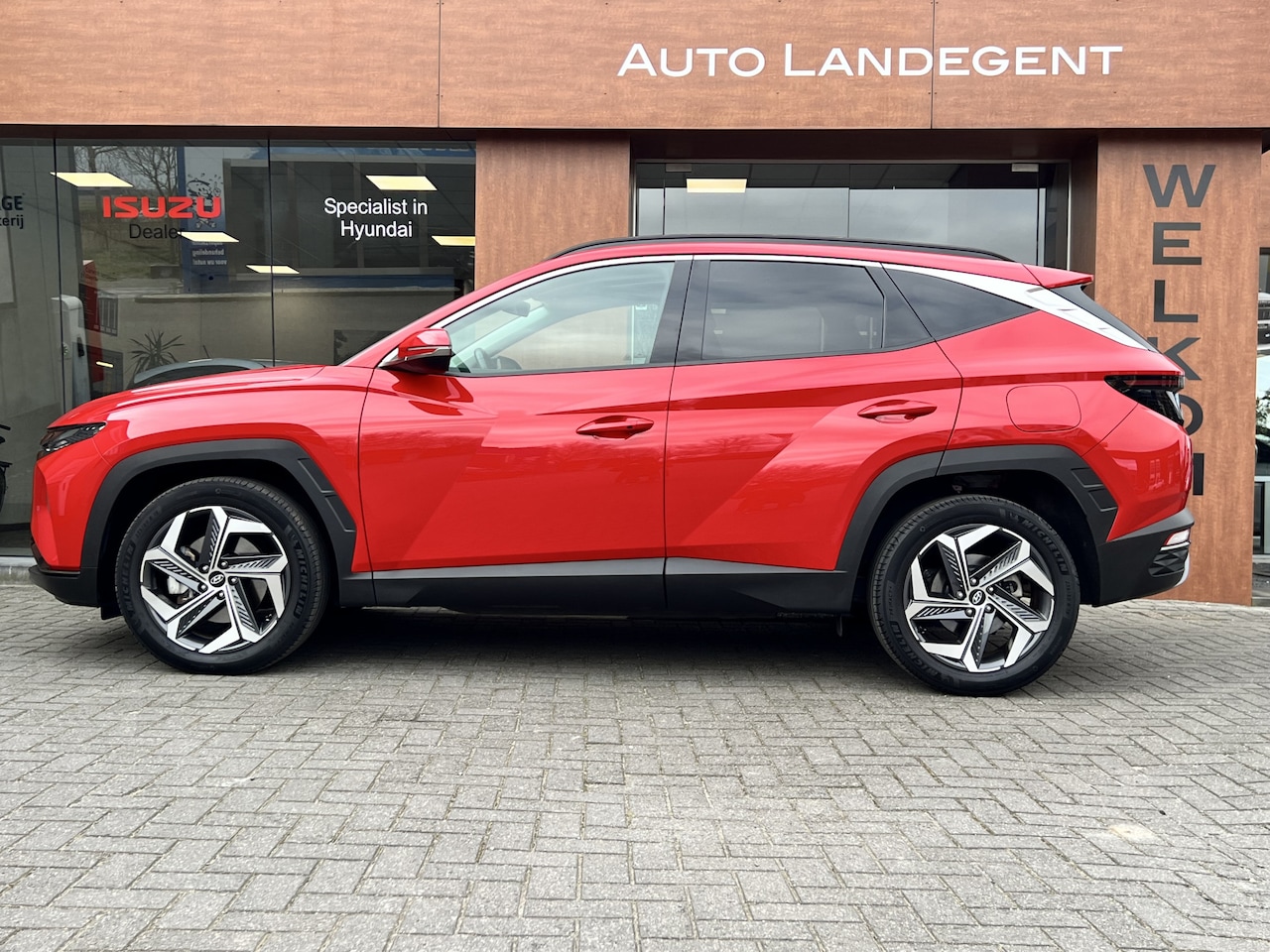 Hyundai Tucson - 1.6 T-GDI HEV Premium Sky - Schuif-/kanteldak | Stoelverw. | Adapt. Cruise C. - AutoWereld.nl