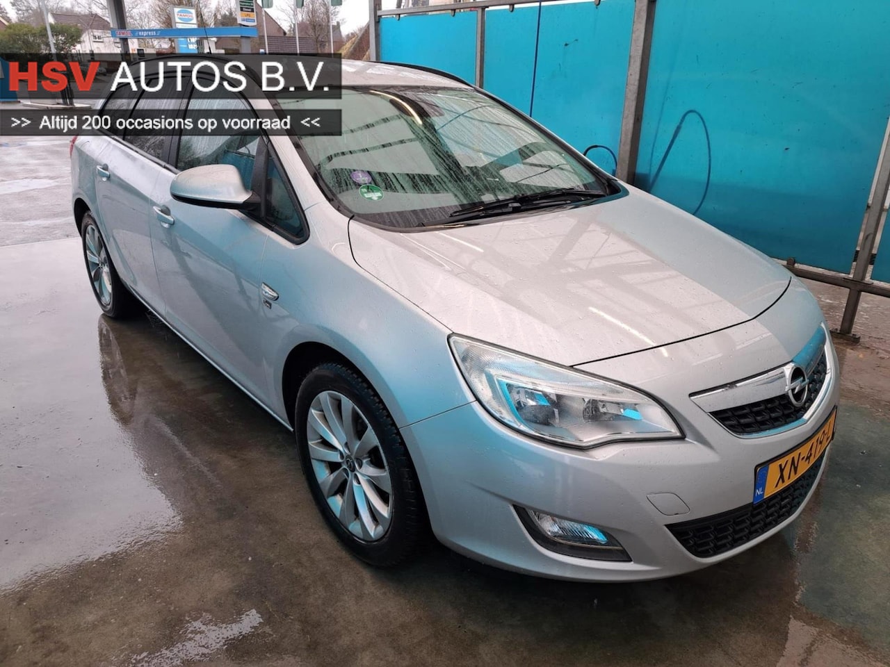 Opel Astra Sports Tourer - 1.4 Turbo Sport airco LM 2e eigenaar - AutoWereld.nl