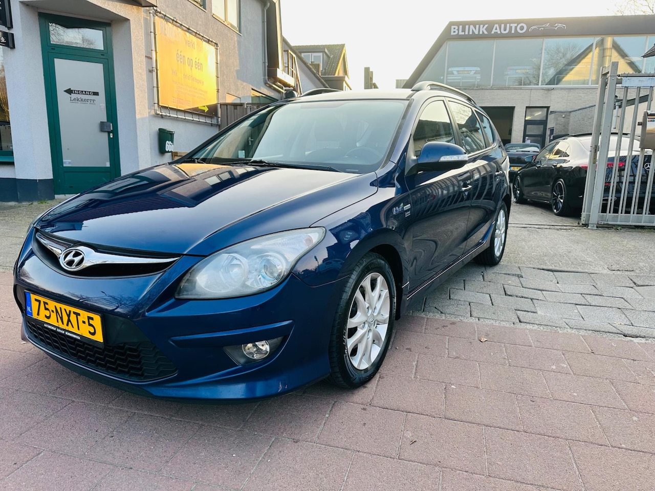 Hyundai i30 CW - 1.4i i-Motion Apk Airco - AutoWereld.nl