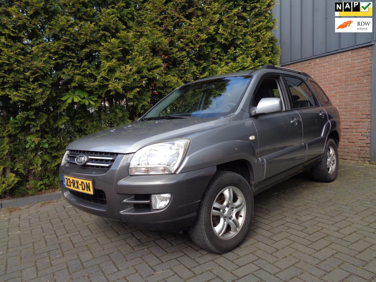 Kia Sportage - 2.0 CVVT Comfort 2.0 CVVT Comfort,Van 1e, eigenaar,Airco,Cruise control - AutoWereld.nl