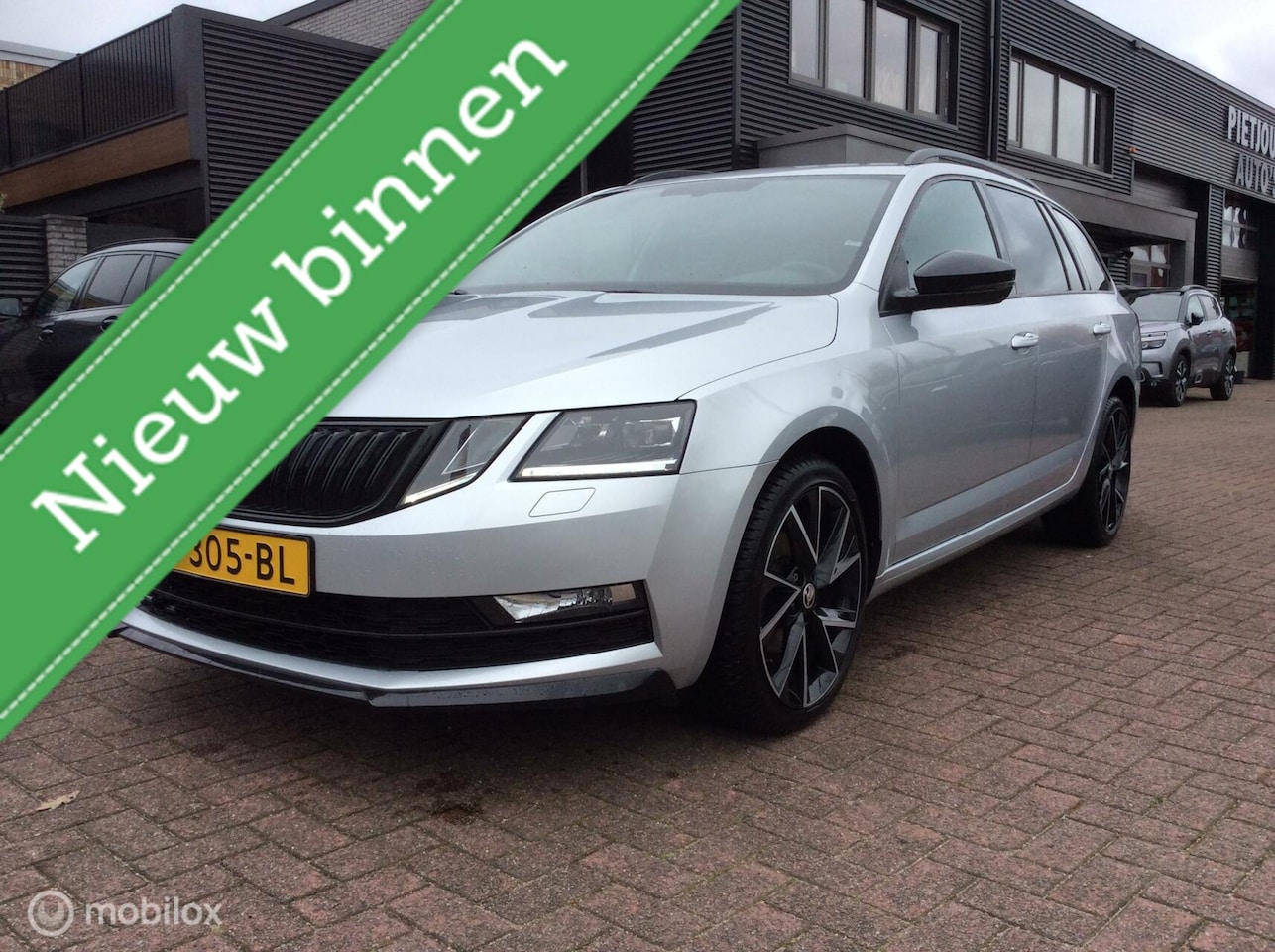 Skoda Octavia Combi - 1.6 TDI Greentech Sport Business 18"nap btw - AutoWereld.nl