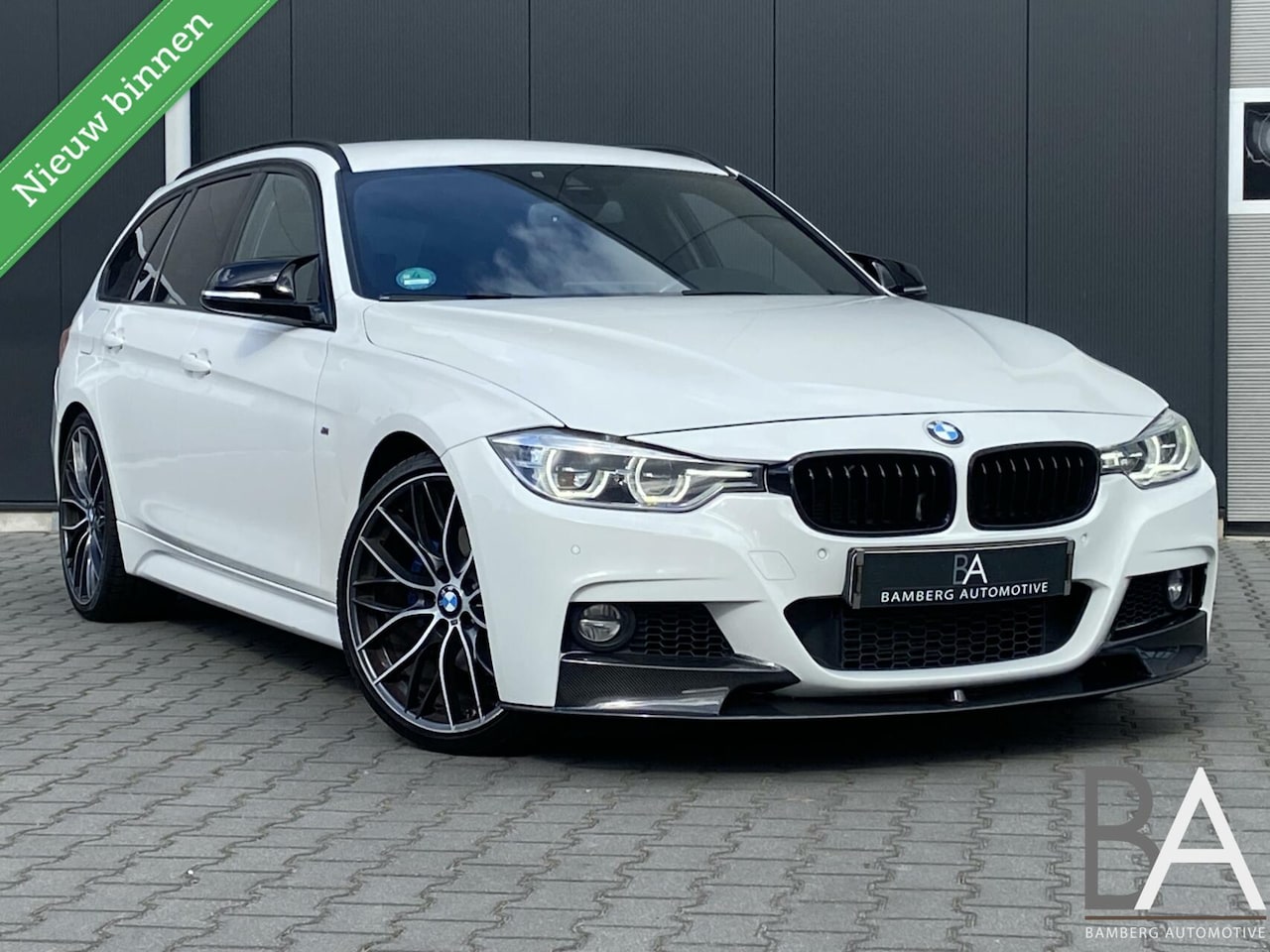 BMW 3-serie Touring - 330d M Sport|20”|cruise|trekhaak|carbon - AutoWereld.nl