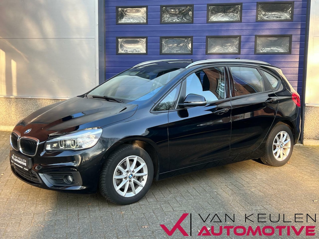 BMW 2-serie Active Tourer - 218i l Trekhaak l Navi l Climate - AutoWereld.nl