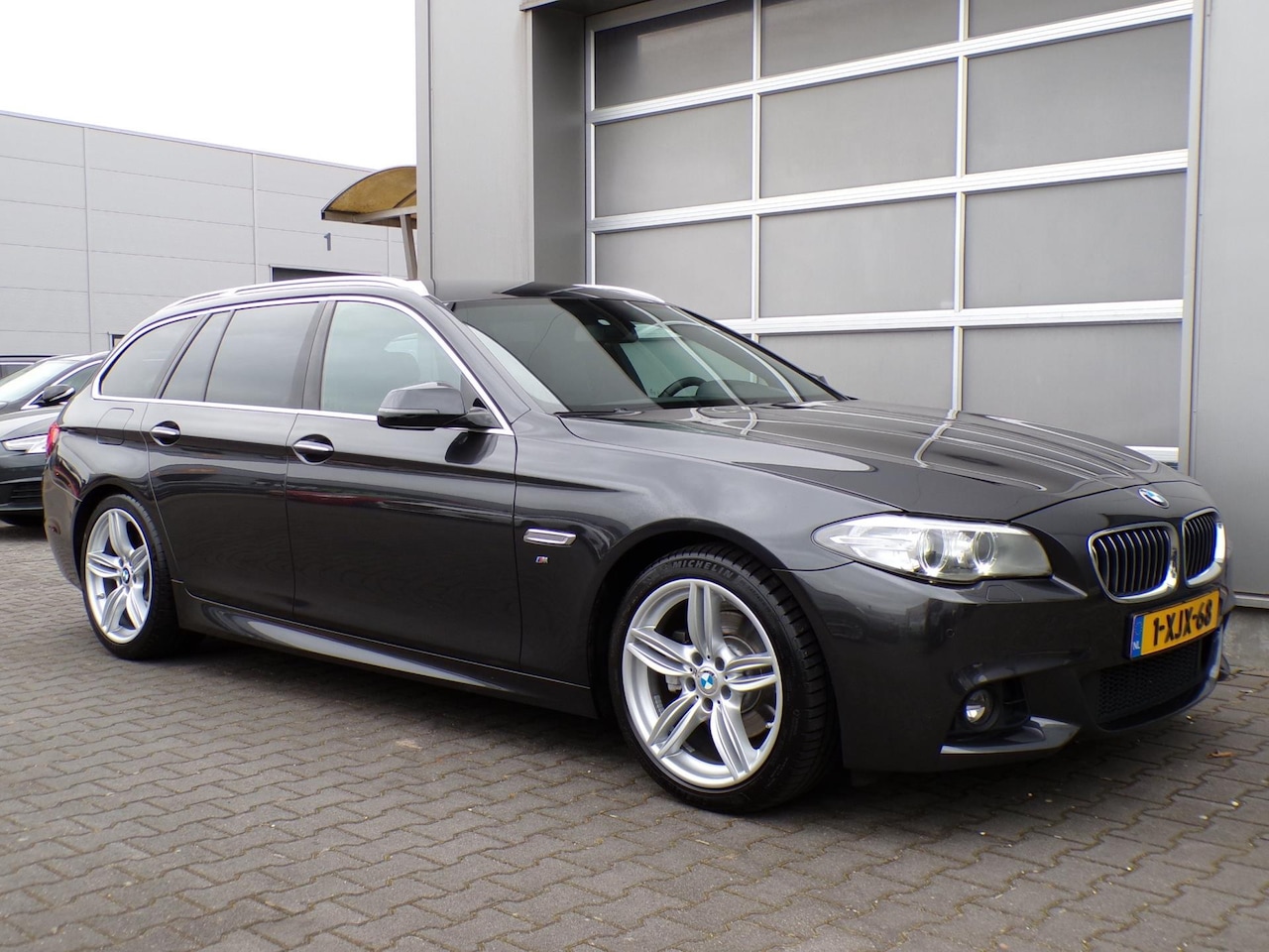 BMW 5-serie Touring - 520i Executive|M-Sport|Xenon|Navi|Alcantara - AutoWereld.nl