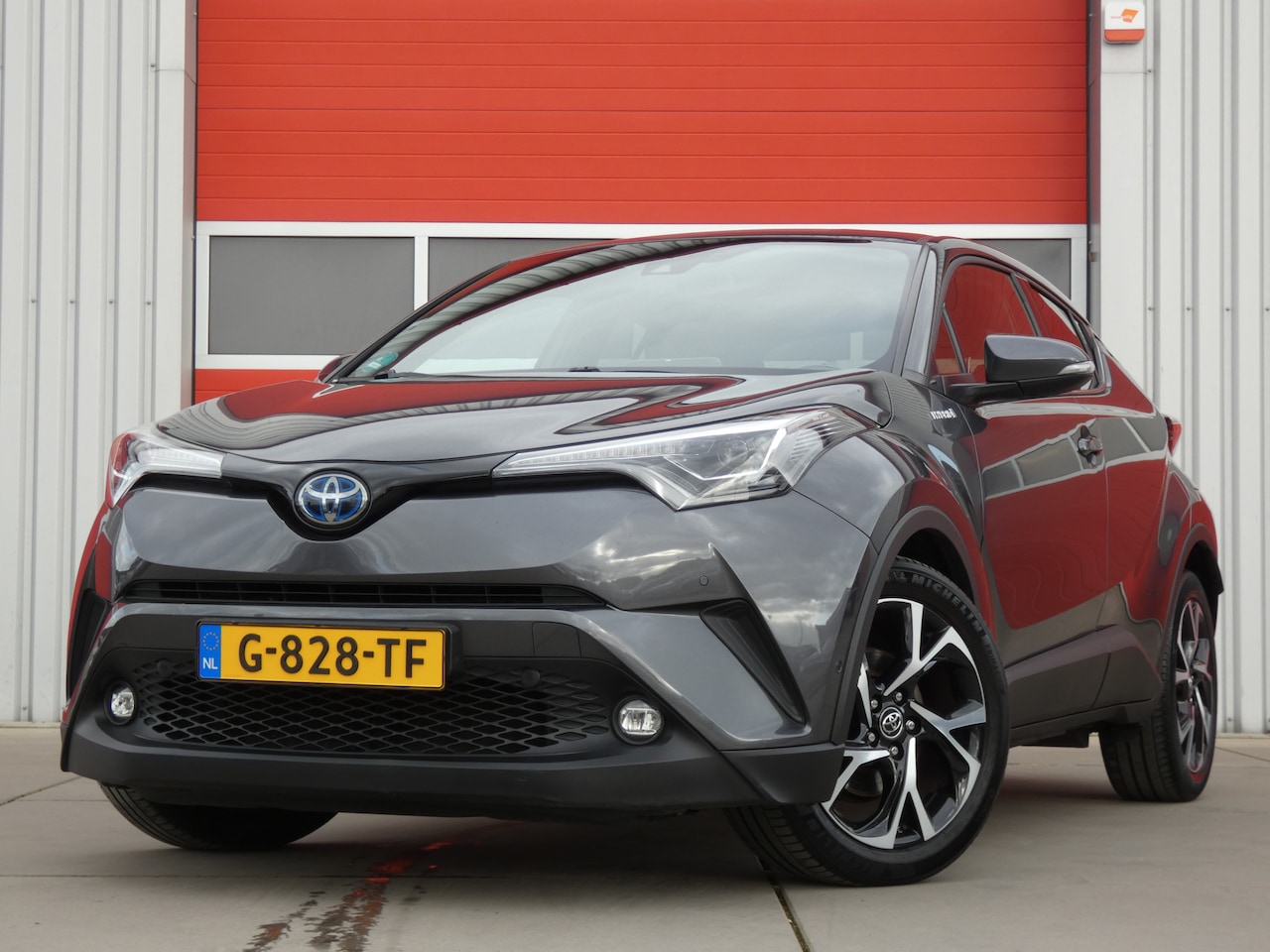 Toyota C-HR - 1.8 Hybrid Style Ultimate/ lage km/ compleet! - AutoWereld.nl