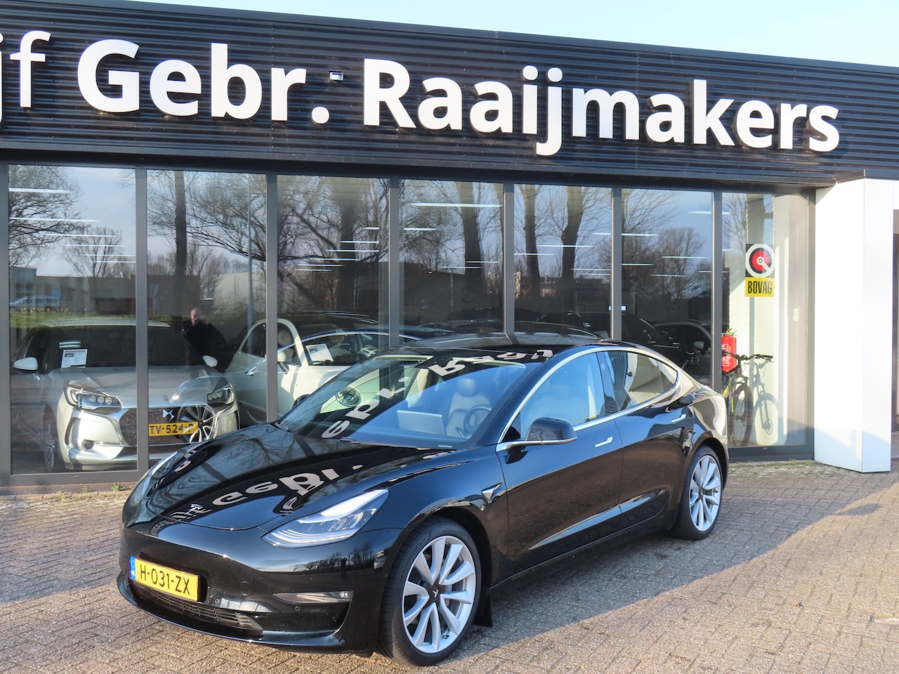 Tesla Model 3 - Long Range RWD Long Range AWD 75 kWh*Acceleratieboost*Autopilot*Trekhaak*Premium Audio* - AutoWereld.nl