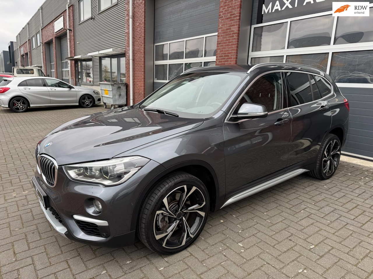 BMW X1 - XDrive20i 192PK AUT LED ACC Navi Camera Lane Stoelvw. - AutoWereld.nl